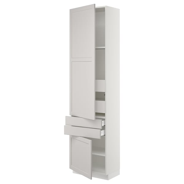 White SEKTION kitchen cabinet with bevelled edges, adjustable shelves, and soft-closing drawers.