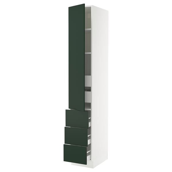 A tall, white SEKTION kitchen cabinet with dark green drawers and a door. It has a sleek design with adjustable shelves inside.