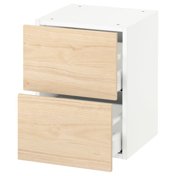White SEKTION kitchen cabinet with light ash wood drawers.