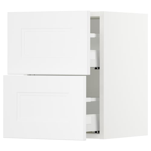 White SEKTION kitchen cabinets. Two upper wall cabinets, two lower drawer units. Modern, minimalist design with smooth fronts.