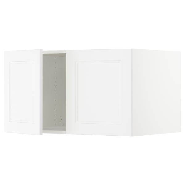 White SEKTION kitchen cabinet with adjustable shelves, hinged door, and soft-close feature.
