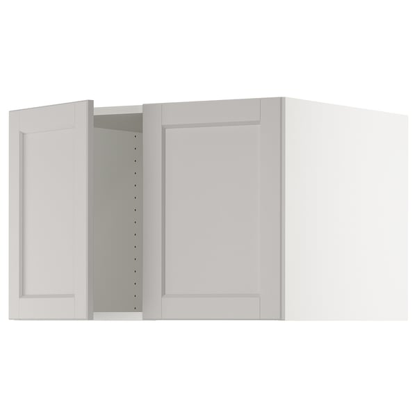 White kitchen cabinet with grey frame and open section.