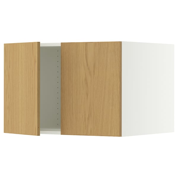 A SEKTION kitchen cabinet in oak veneer with a white frame. It has two adjustable shelves and damper hinges for silent closure.