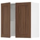 An open wooden cabinet from the SEKTION kitchen system in walnut with adjustable shelves and soft-closing hinges.