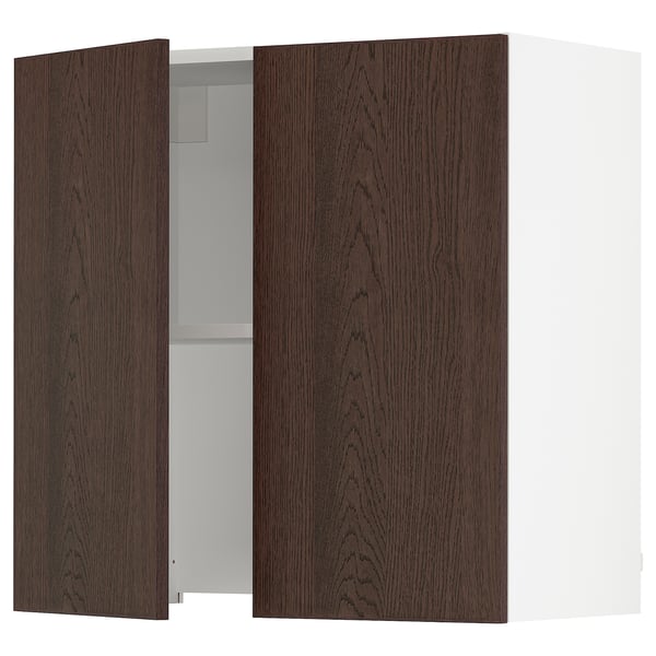 Wooden kitchen cabinet with dark brown doors and white interior, showcasing shelves and a hinge.
