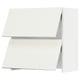 White SEKTION kitchen cabinet with angled design and slatted door.