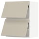 SEKTION kitchen cabinets in beige, smooth clean design, rectangular shape, two wall units with angled tops.