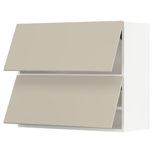 SEKTION: beige kitchen cabinets, smooth & modern. Two slanted shelves on white background.