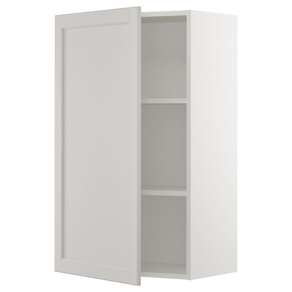 White cabinet with one open door, two shelves, square shape, bevelled edges, simple design.