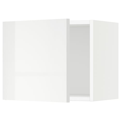 A white, high-gloss kitchen cabinet with a sleek, modern design.
