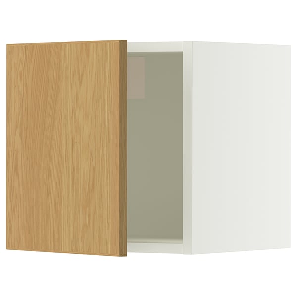 Ikea SEKTION oak cabinet door, part of a modern kitchen unit. Wooden finish, rectangular shape, with light beige painted interior.