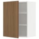 White SEKTION kitchen cabinet with walnut door, adjustable shelves, partial door open.