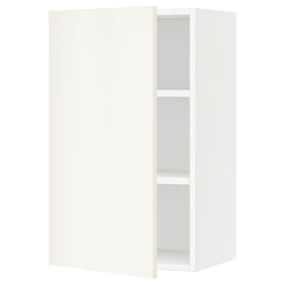 A white SEKTION wall cabinet with two adjustable shelves. It has a modern, minimalist design with clean lines.