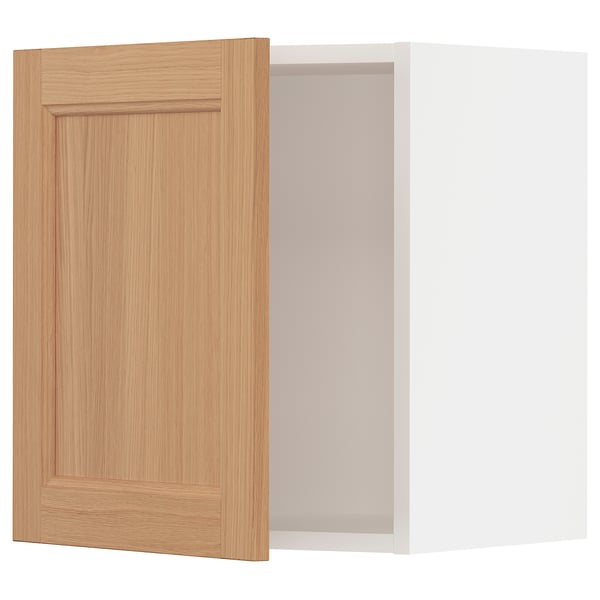A light oak wooden cabinet door from the ikea SEKTION series. It a minimalist design with a natural, warm look.