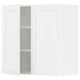 White kitchen cabinet with one open door showing shelves.