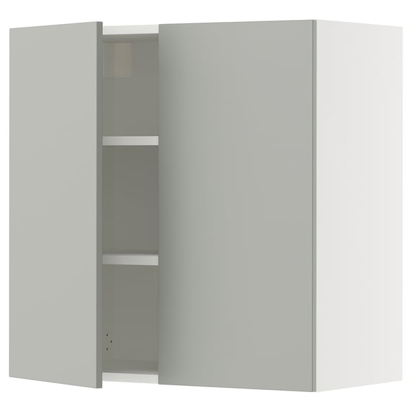 Modern kitchen cabinet, light grey, square shape, with one door open revealing adjustable shelf.