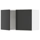 SEKTION kitchen cabinets in matt black with metallic silver interior.