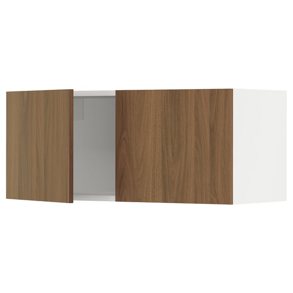 Modern SEKTION kitchen cabinet with walnut doors, one open revealing grey interior.