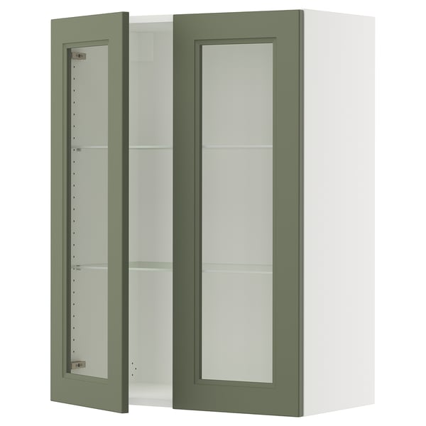 Green glass-door kitchen cabinet with white frame and adjustable shelves.