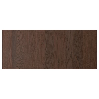 Brown wooden panel with visible grain and veneer edge.