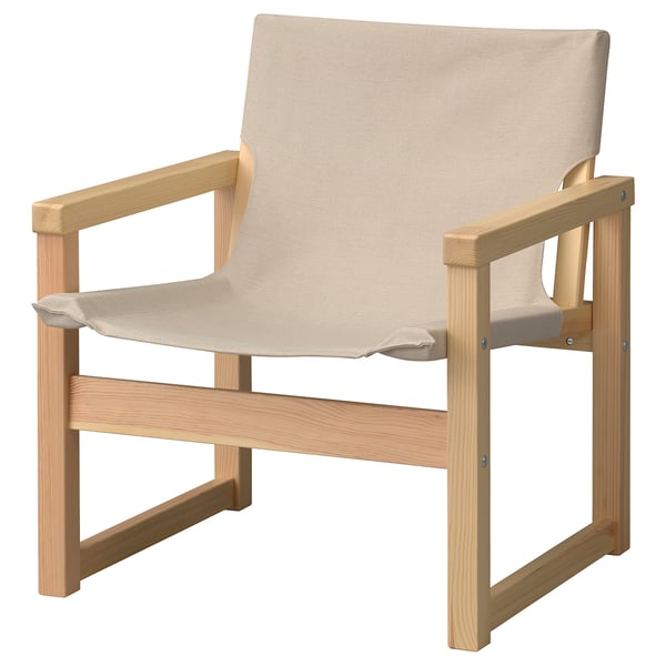 Displays an ikea SJÄLSÖ armchair with light-colored fabric and wooden frame.