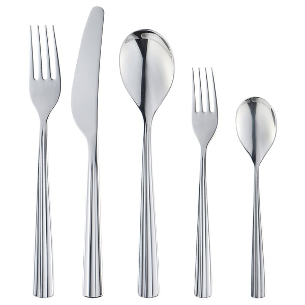 Set of six metallic utensils: fork, knife, spoon, salad fork, tea spoon. Sleek, shiny design, all stainless steel.