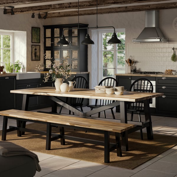 SKOGSTA wood and black bench, fits perfectly under a large table, farmhouse kitchen scene.