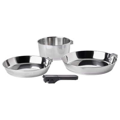 Three stainless-steel pots with detachable handles. Modern, minimalist design. Ideal for small kitchens.