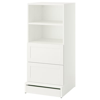 A white SMÅSTAD bookcase with shelves and drawers for storage. The modern design offers both open and closed spaces, ideal for kids rooms.