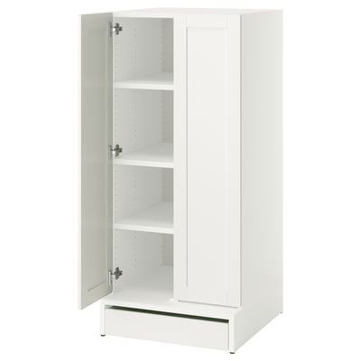 A white SMÅSTAD cabinet with one door open, revealing three shelves and a soft-close hinge.