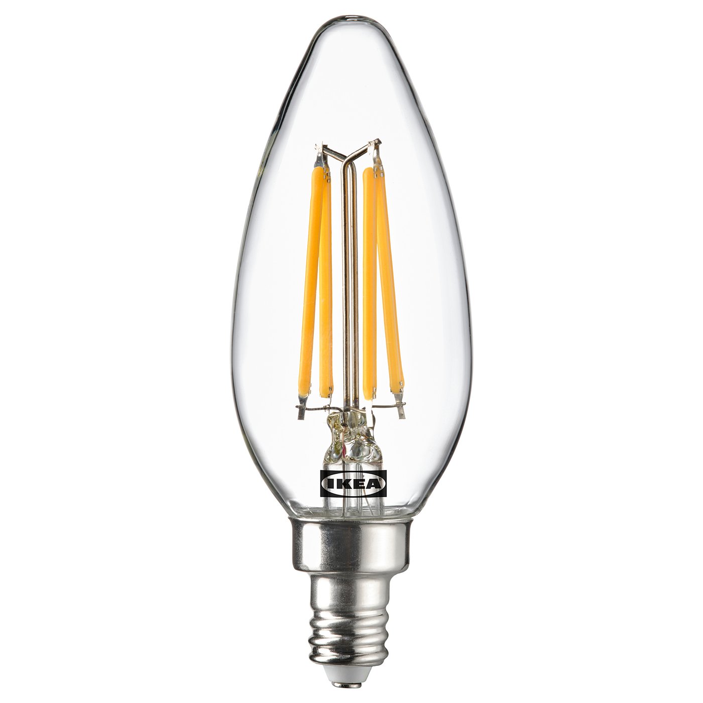 An ikea SOLHETTA led light bulb with a warm-white glow, featuring a glass cover and a classic candle shape.