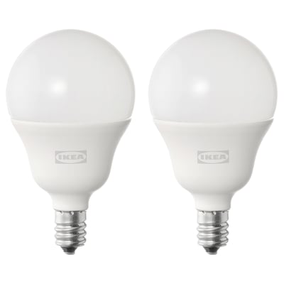 Two white ikea SOLHETTA bulbs; round shape, silver base, frosted dome.