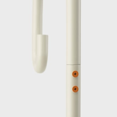 White solar lamps sturdy build with orange screws, appears robust and durable.