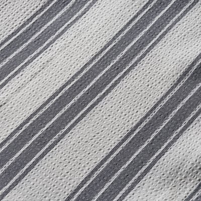 Close-up of shower curtain fabric, striped, densely woven, textured.
