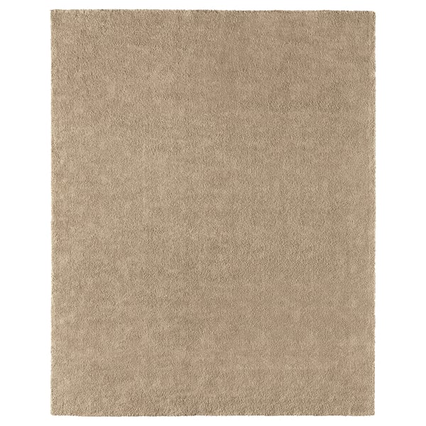 A beige, rectangular STOENSE rug with a simple design, made from polypropylene.
