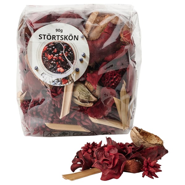 Clear plastic bag filled with red and brown dried plant pieces, labelled STÖRTSKÖN.