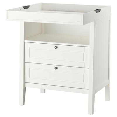 White ikea SUNDVIK changing table with drawers and flat surface.