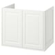 White TÄNNFORSEN bathroom cabinet with classic bevelled panel design.