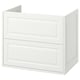 White TÄNNFORSEN bathroom cabinet with classic bevelled edges for stylish storage.