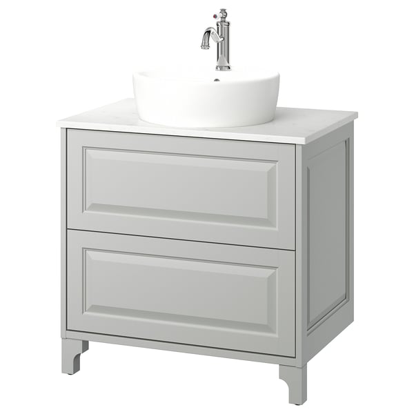 Elegant light grey TÄNNFORSEN bathroom vanity with rounded countertop basin.