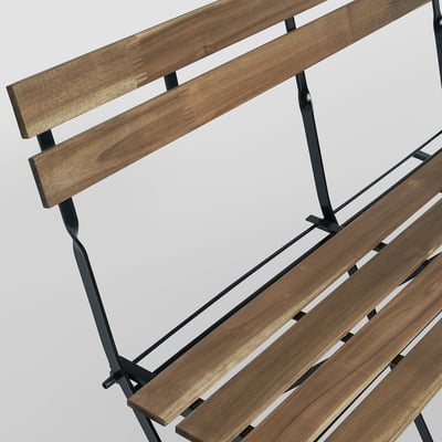 Wooden 2-seater bench with black metal frame, showing quality craftsmanship and sturdy design.