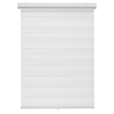 A TANDLUNDFLY white double roller blind with a cordless design, offering light and privacy control.