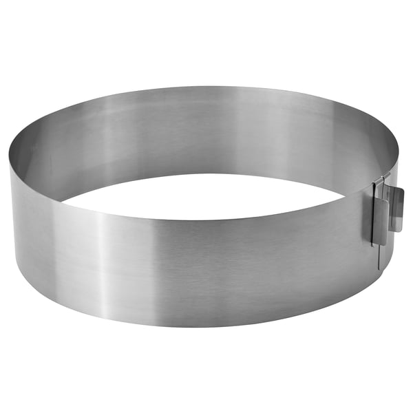 A TÅRTBAK round cake baking ring, silver, adjustable, made of stainless steel.