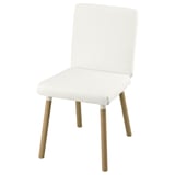 A modern white chair named TONSTAD with wooden legs and a padded seat and backrest.
