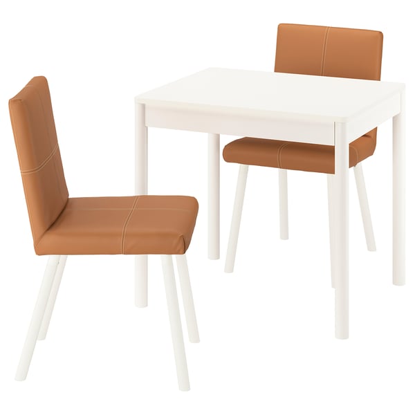 Image shows a white TONSTAD dining set with two brown chairs and a square table.