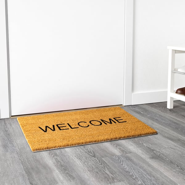 Welcome mat with welcome text, anti-slip backing, for indoor use.