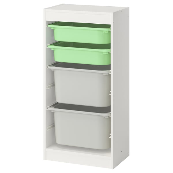 White ikea TROFAST storage with green & white containers for kids toys.