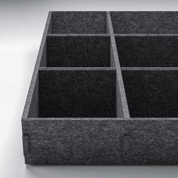 Black drawer organiser with adjustable compartments for kitchen drawers.