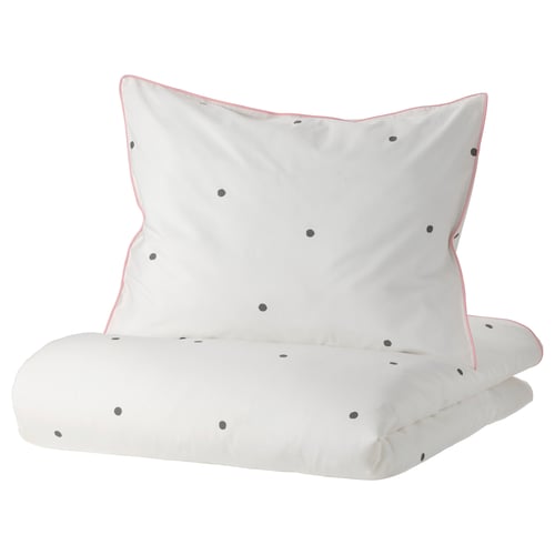 A VÄNKRETS white duvet cover and pillowcase set with pink piping and black dots. Made of cotton and viscose, featuring a zip closure.