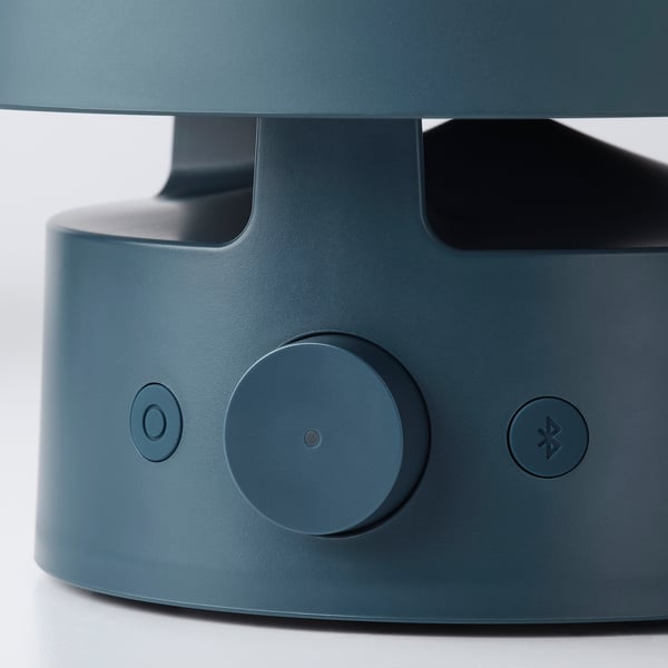 A sleek, blue, outdoor bluetooth speaker lamp with intuitive controls, combining modern style and functionality.